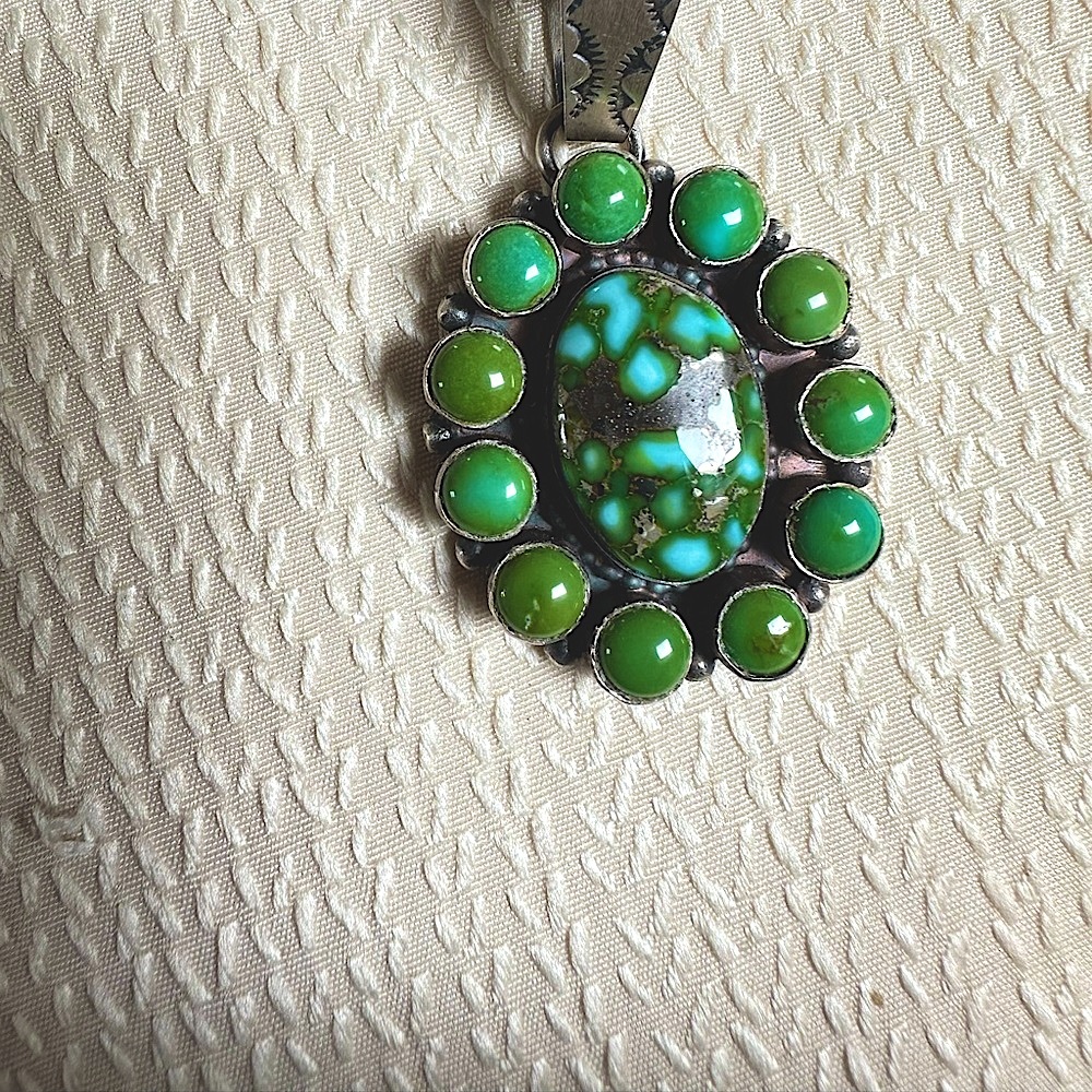 Pansy Johnson(Navajo) Sonoran gold pendant on machine made pearls
